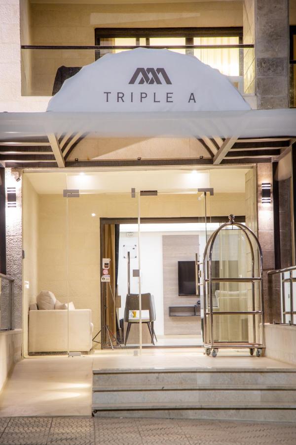 Triple A Hotel Suites Amman Bagian luar foto