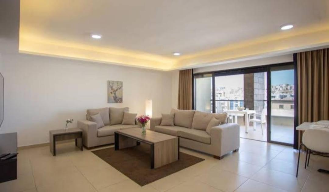 Triple A Hotel Suites Amman Bagian luar foto